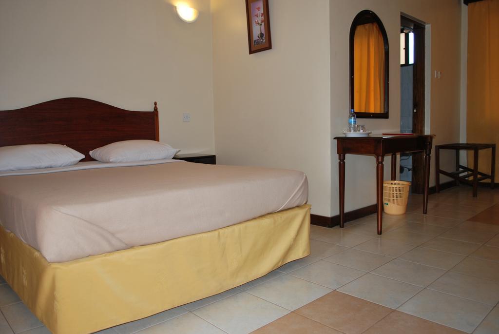 Parkview Inn Moshi Pokoj fotografie