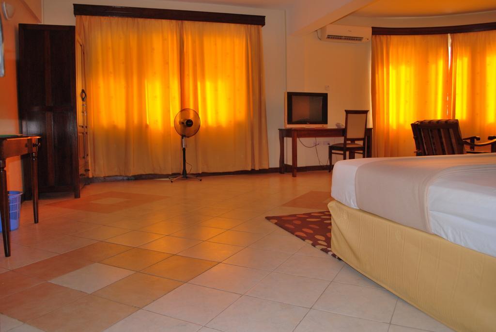 Parkview Inn Moshi Pokoj fotografie