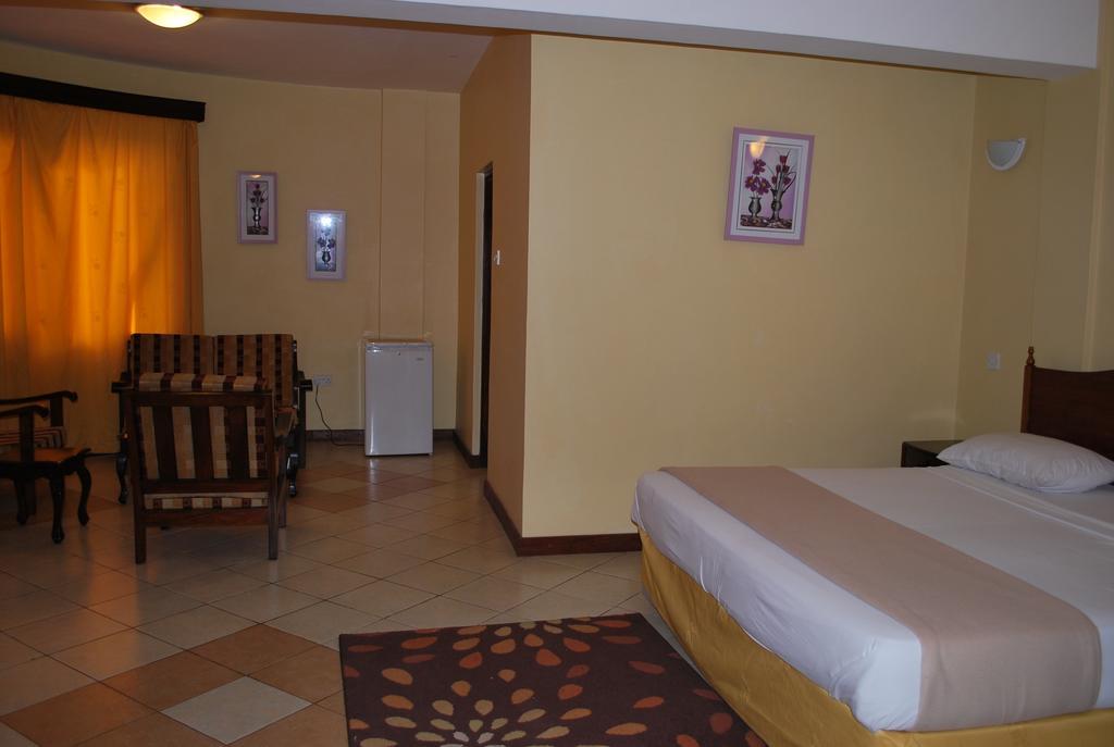 Parkview Inn Moshi Pokoj fotografie