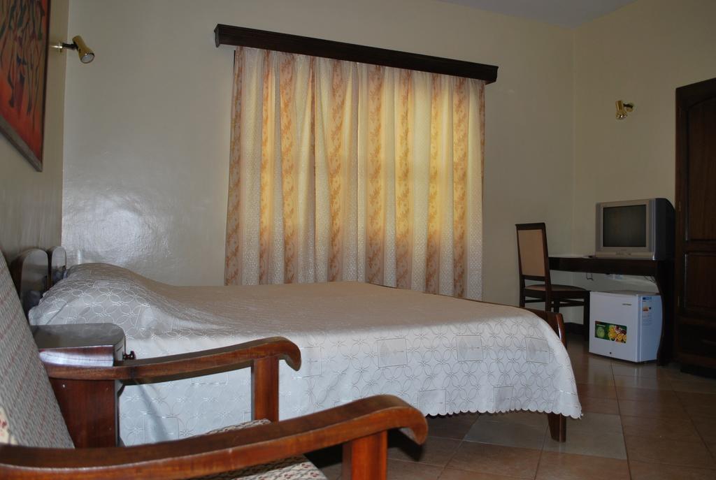 Parkview Inn Moshi Pokoj fotografie