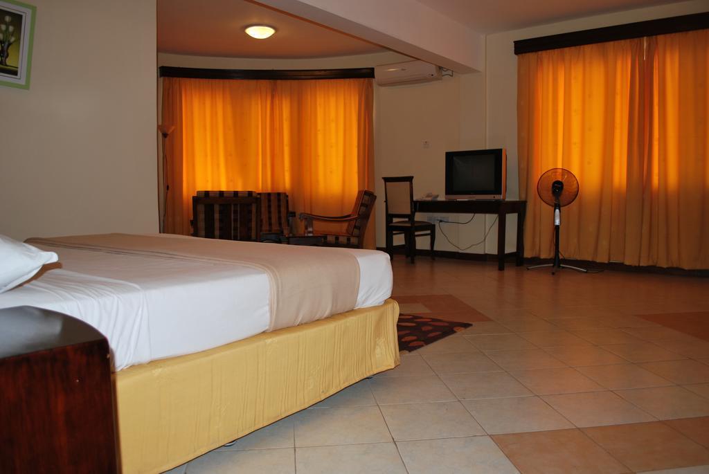 Parkview Inn Moshi Pokoj fotografie
